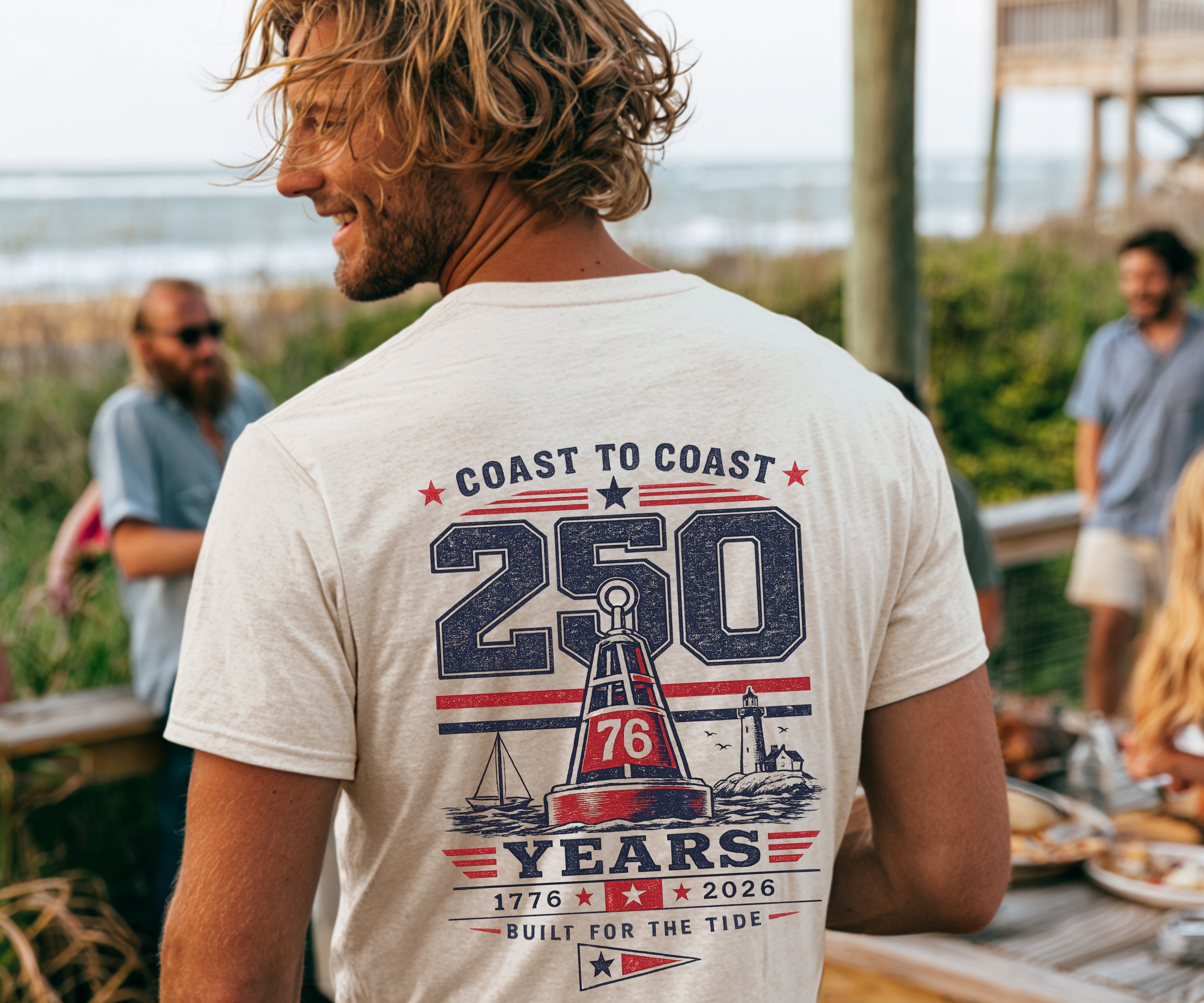 Back of Frequensea Coast to Coast 250 tee featuring nautical design with a boat, a buoy and a lighthouse.  Americana themed apparel.